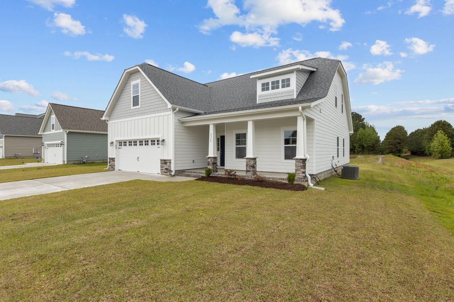 Representative exterior photo of a completed home built from the Hillcrest by Bill Clark Homes in Laurel Oaks, Greenville, NC (Image 22). Representative exterior photo of a completed home built from the Hillcrest by Bill Clark Homes in Laurel Oaks, Greenville, NC (Image 22).