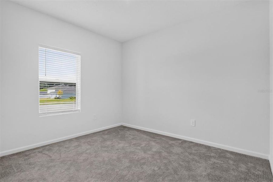 Spacious, unfurnished interior of a new home in Tara Forest East, Alachua (Image 25).