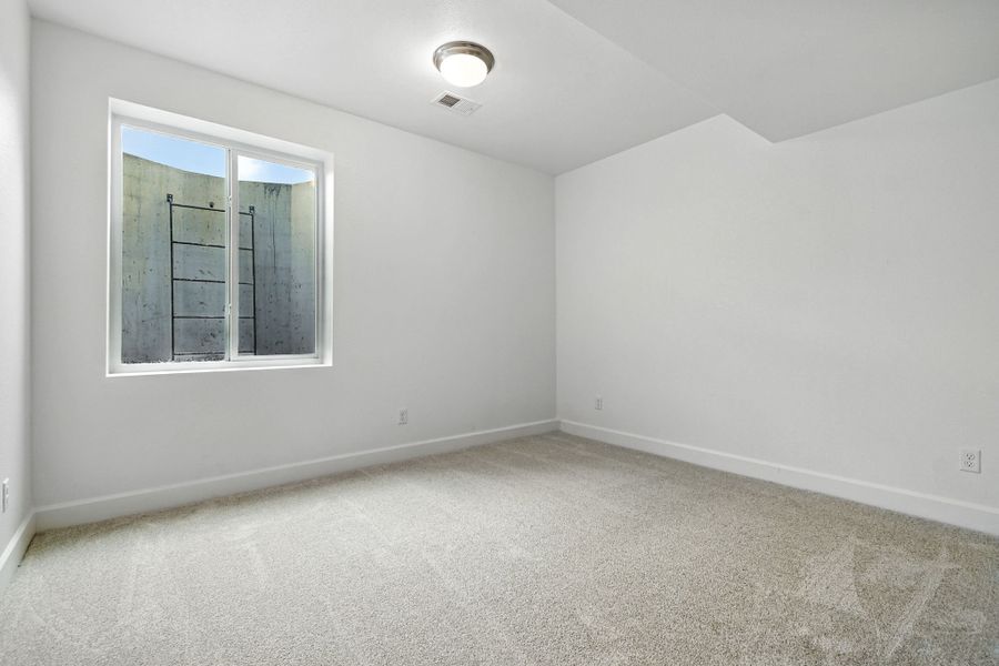 Spacious, unfurnished interior of a new home in Trailstone, Arvada (Image 30).