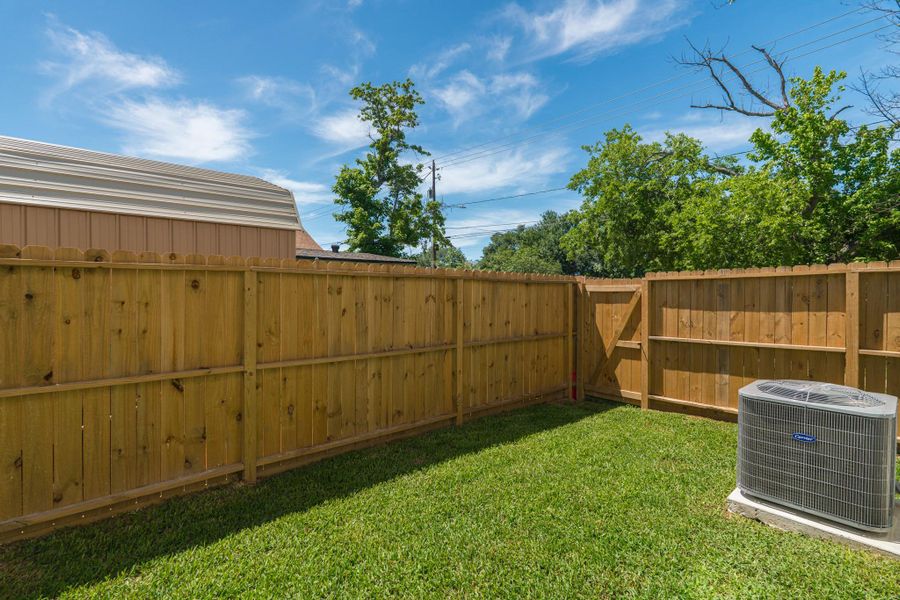 Exterior details and patio area of a home in , Houston (Image 4). Exterior details and patio area of a home in , Houston (Image 4).