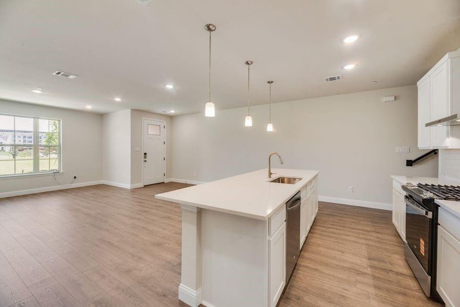 Furnished interior view inside a new home in Bayside, Rowlett (Image 8). Furnished interior view inside a new home in Bayside, Rowlett (Image 8).