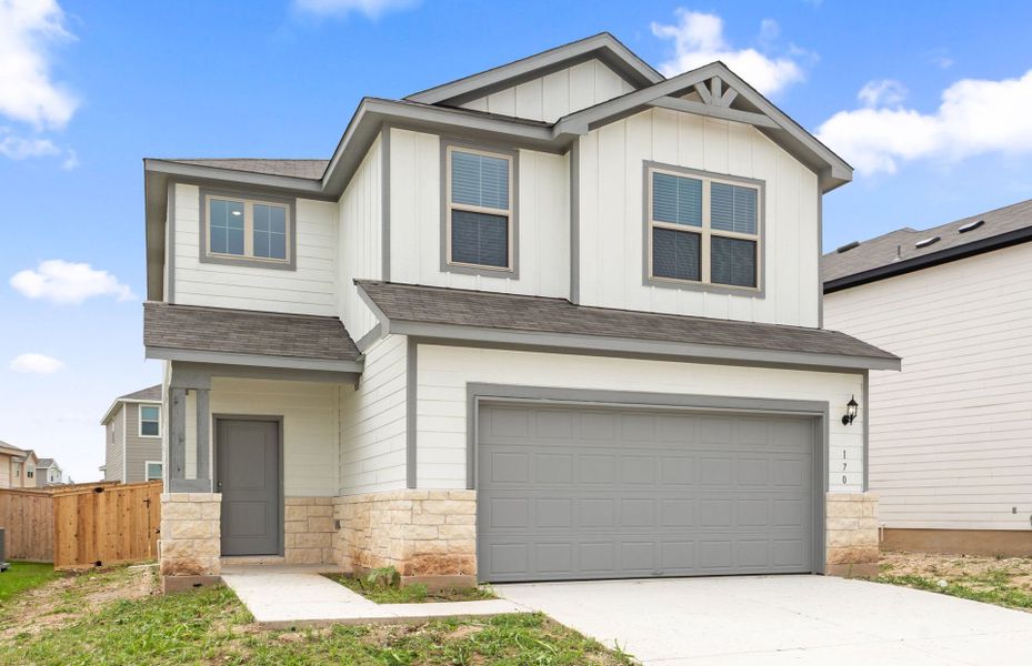 Front exterior of a new home in Sonterra, Jarrell, TX, highlighting curb appeal (Image 25). Front exterior of a new home in Sonterra, Jarrell, TX, highlighting curb appeal (Image 25).