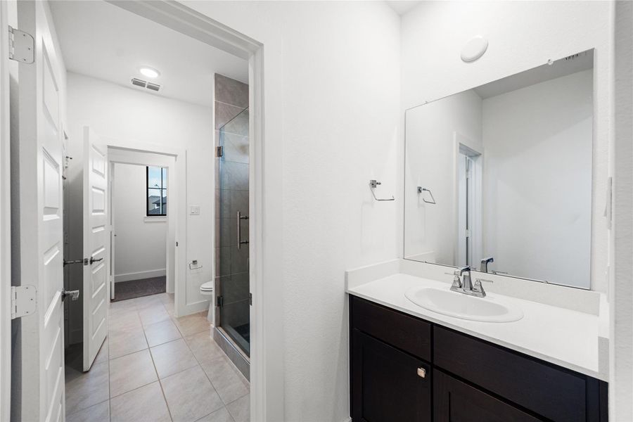 Furnished interior view inside a new home in Harvest Green, Richmond (Image 13).