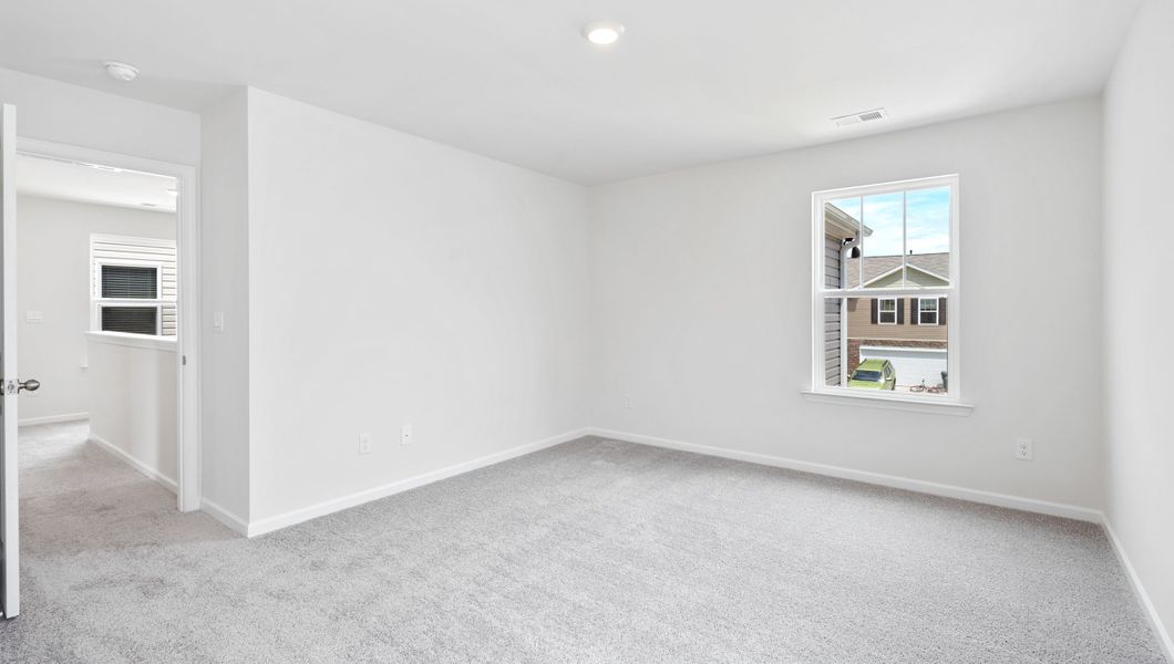 Representative unfurnished interior of a home built from the AISLE by D.R. Horton in Harrier Point, Woodruff (Image 21).