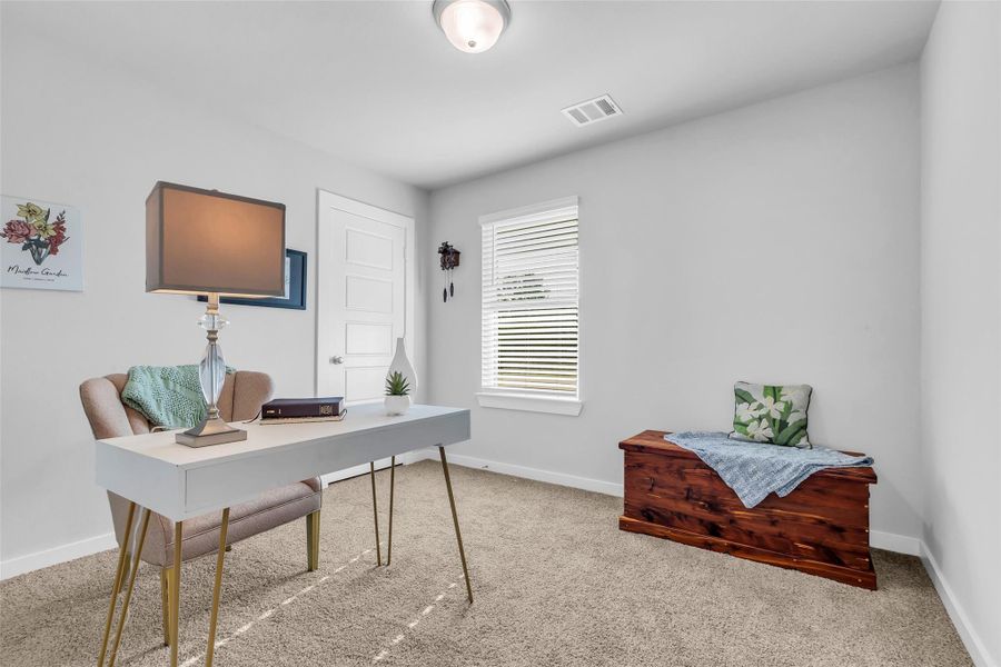 Secondary bedroom perfect for a study/office.