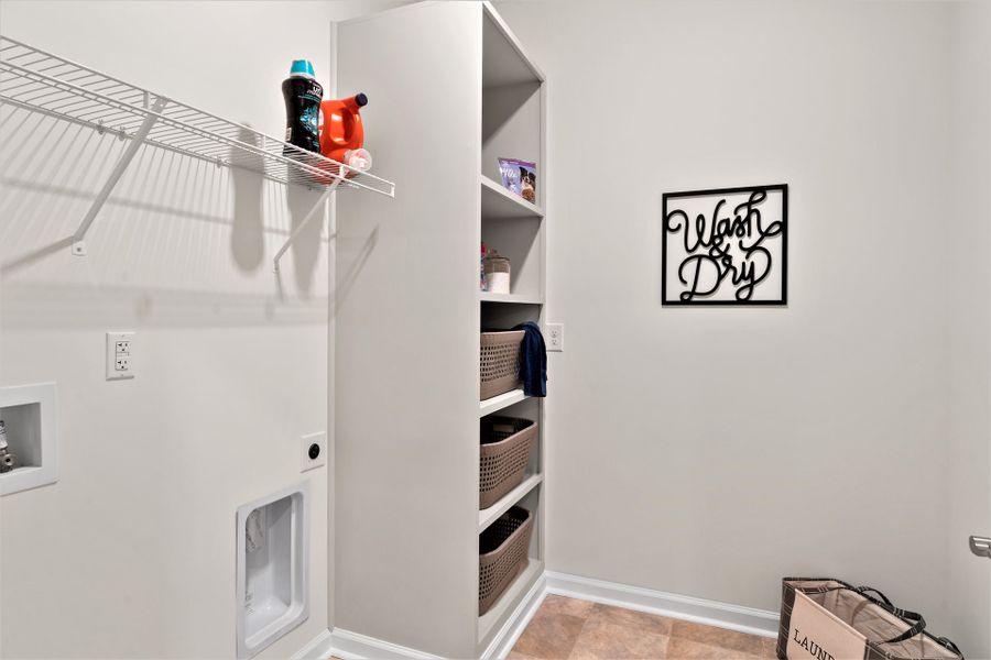Representative furnished interior of a home built from the The Cherry Grove by Chesapeake Homes in Coastal Club of the Carolinas, Calabash (Image 37).