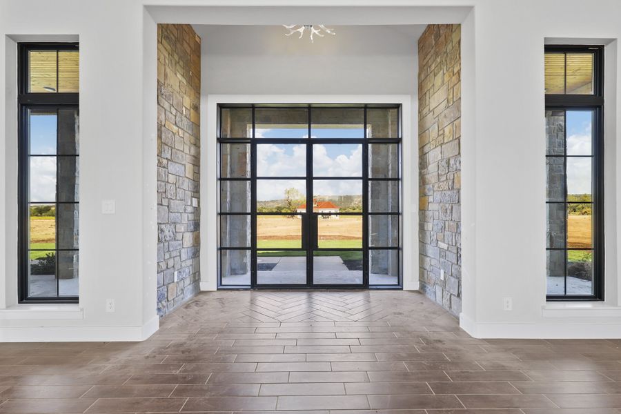 Furnished interior in a model home at Ranger Ridge in Strawn (Image 7).