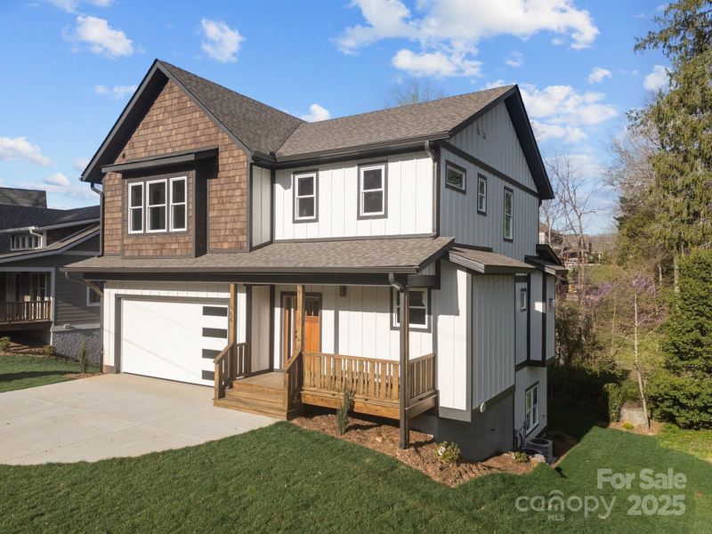 Front exterior of a new home in , Asheville, NC, highlighting curb appeal (Image 2). Front exterior of a new home in , Asheville, NC, highlighting curb appeal (Image 2).