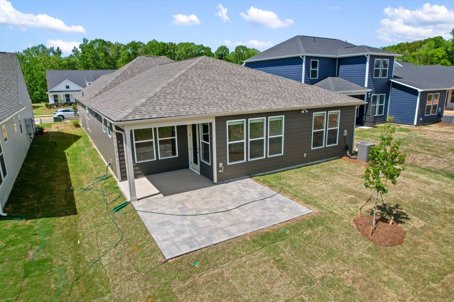 Exterior details and patio area of a home in Carolina Riverside, Belmont (Image 3).