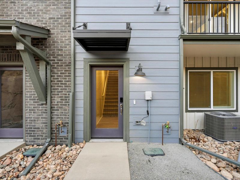Exterior details and patio area of a home in Three Hills, Morrison (Image 4).
