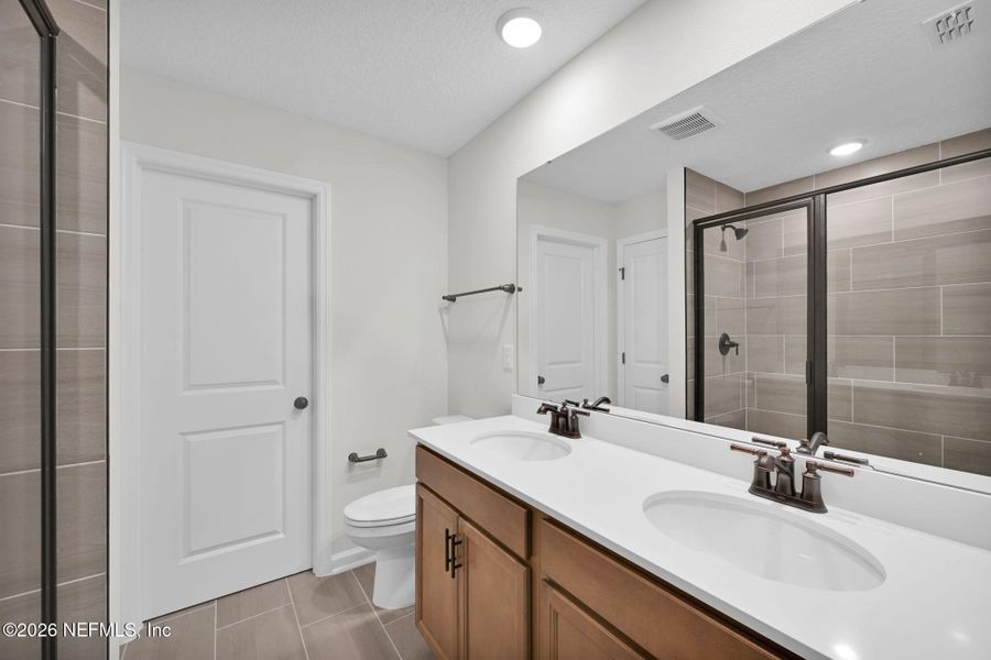 Furnished interior view inside a new home in Baxley Villas, Middleburg (Image 11).