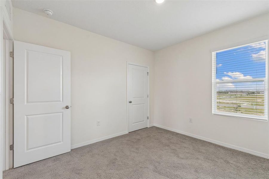 Spacious, unfurnished interior of a new home in Epperson, Wesley Chapel (Image 67).