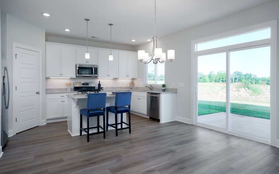Representative furnished interior of a home built from the The Kennedy by Cothran Homes in Holly Ridge, Greenville (Image 9).