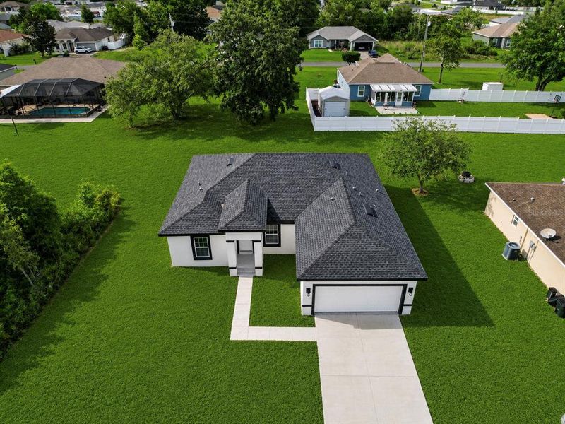 Front exterior of a new home in , Ocala, FL, highlighting curb appeal (Image 25).