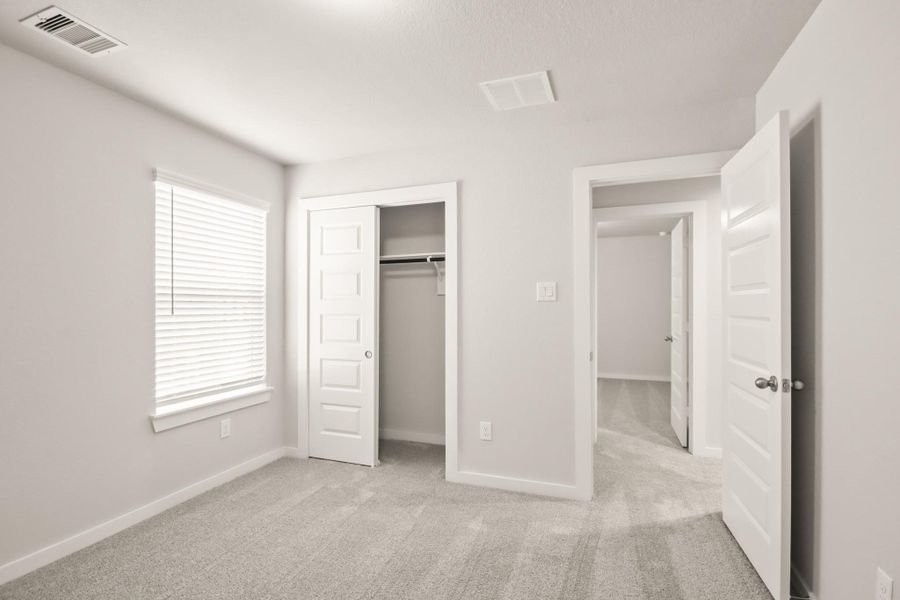 Spacious, unfurnished interior of a new home in Barton Creek Ranch, Conroe (Image 16). Spacious, unfurnished interior of a new home in Barton Creek Ranch, Conroe (Image 16).