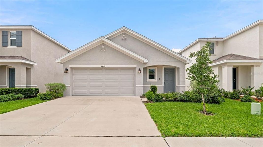 Front exterior of a new home in Northwater at Two Rivers, Zephyrhills, FL, highlighting curb appeal (Image 2).