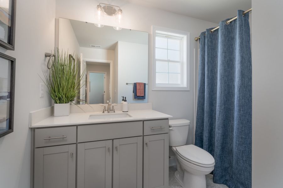 Representative furnished interior of a home built from the 3320 by Adams Homes in Norris Landing, Snellville (Image 37).