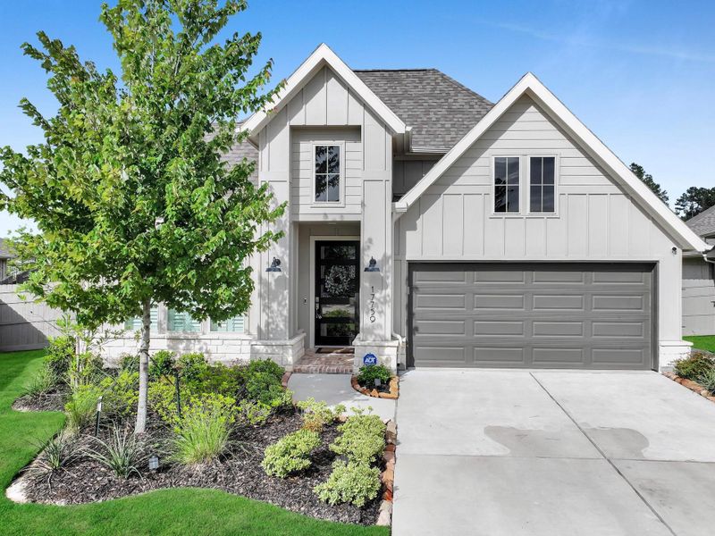 Front exterior of a new home in Artavia, Conroe, TX, highlighting curb appeal (Image 28).