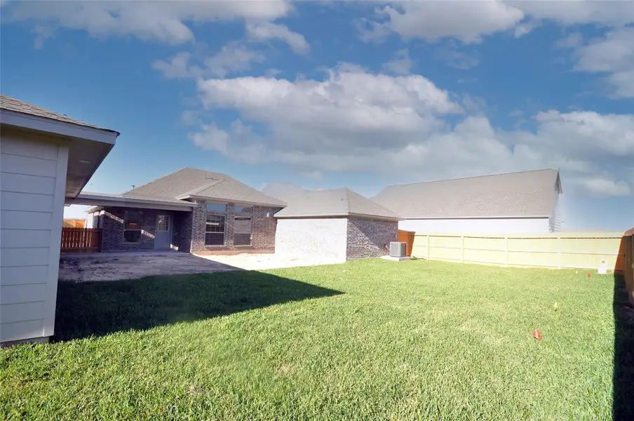 Exterior details and patio area of a home in Pedregal, League City (Image 25).