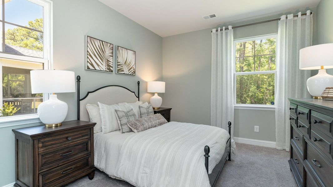 Representative furnished interior of a home built from the HARBOR OAK by D.R. Horton in Spring View Landing, Loris (Image 26).