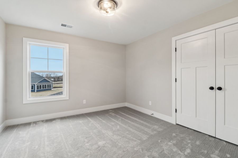 Representative unfurnished interior of a home built from the Ashbourne II by Great Southern Homes in Collins Cove, Chapin (Image 45).