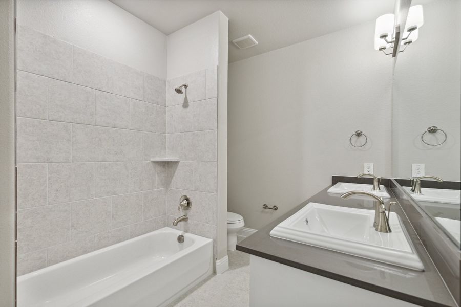 Image 10 representing the Carter by Megatel Homes in Manors at Woodbridge, Wylie, TX. Image 10 representing the Carter by Megatel Homes in Manors at Woodbridge, Wylie, TX.