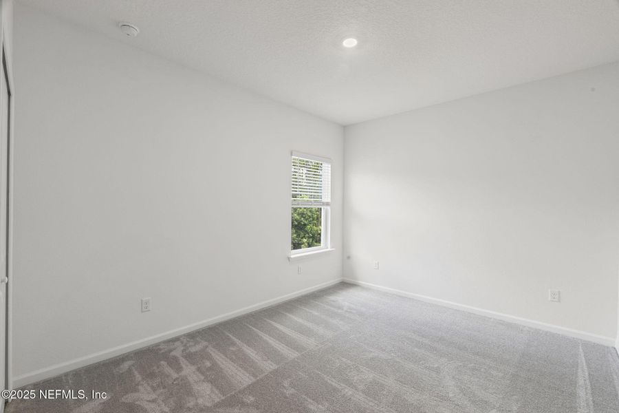 Spacious, unfurnished interior of a new home in Beacon Lake, St. Augustine (Image 47).