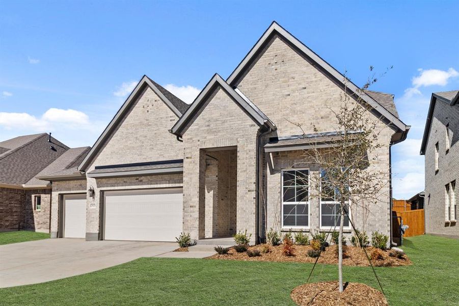 Front exterior of a new home in Lyons Crest Estates, Garland, TX, highlighting curb appeal (Image 19). Front exterior of a new home in Lyons Crest Estates, Garland, TX, highlighting curb appeal (Image 19).