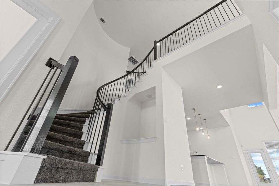 Wow, what a Wow Factor! Sweeping stairway and dramatic iron catwalk leading to the game room and media room! Wow, what a Wow Factor! Sweeping stairway and dramatic iron catwalk leading to the game room and media room!
