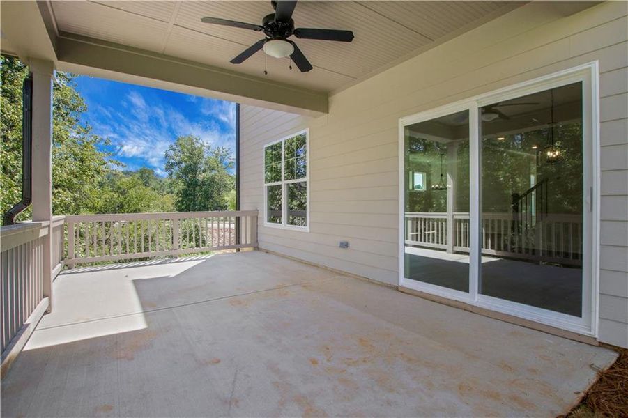 Exterior details and patio area of a home in Marble Tree, Ball Ground (Image 24).