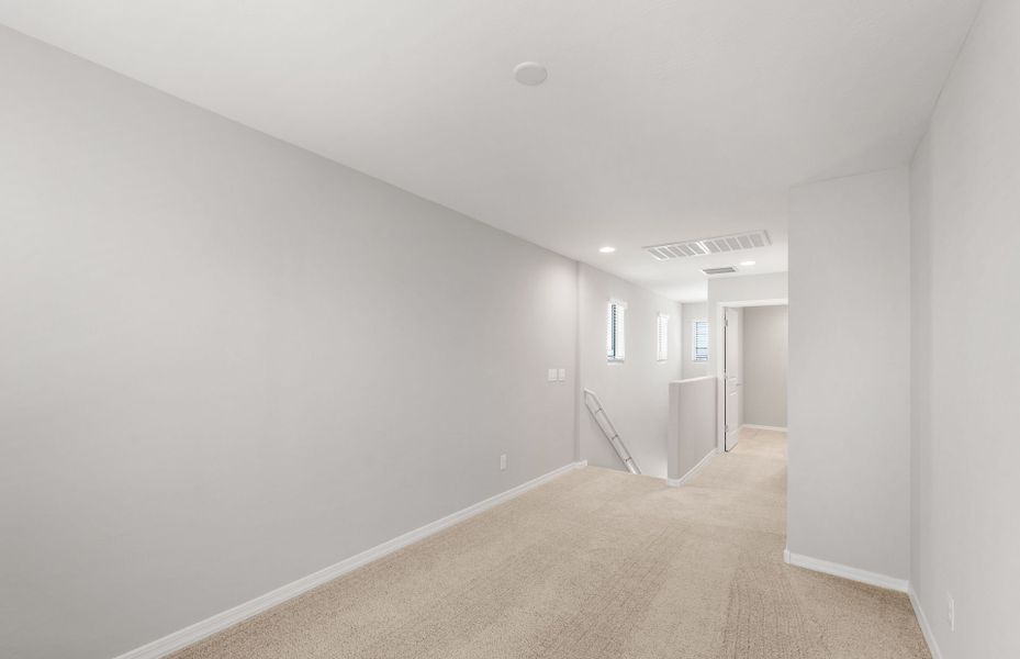 Spacious, unfurnished interior of a new home in Asante- Atrium Series, Surprise (Image 20).