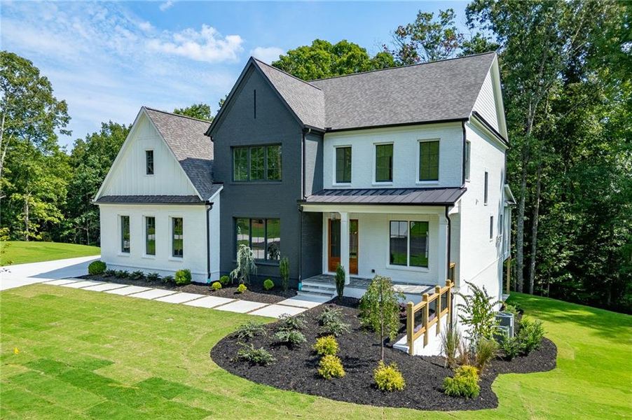 Front exterior of a new home in , Buford, GA, highlighting curb appeal (Image 34).