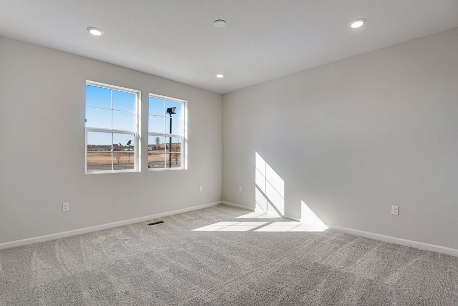 Spacious, unfurnished interior of a new home in Candelas Townhomes, Arvada (Image 37).