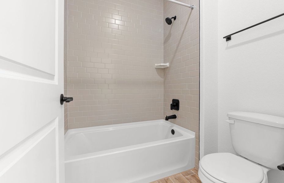 Furnished interior view inside a new home in West Cypress Hills, Spicewood (Image 8).