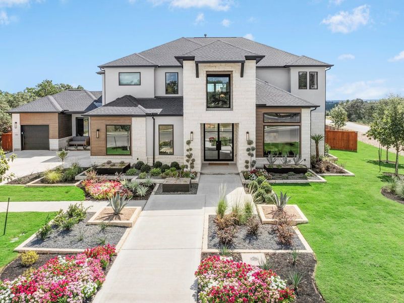 Representative exterior photo of a completed home built from the Emory by Scott Felder Homes in Caliterra, Dripping Springs, TX (Image 25). Representative exterior photo of a completed home built from the Emory by Scott Felder Homes in Caliterra, Dripping Springs, TX (Image 25).