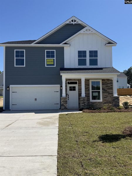 Front exterior of a new home in Cottages at Roofs Pond, West Columbia, SC, highlighting curb appeal (Image 25).