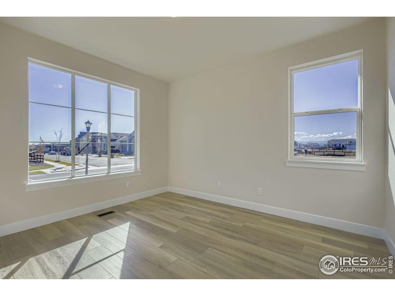 Spacious, unfurnished interior of a new home in RainDance National 60/70, Windsor (Image 16).