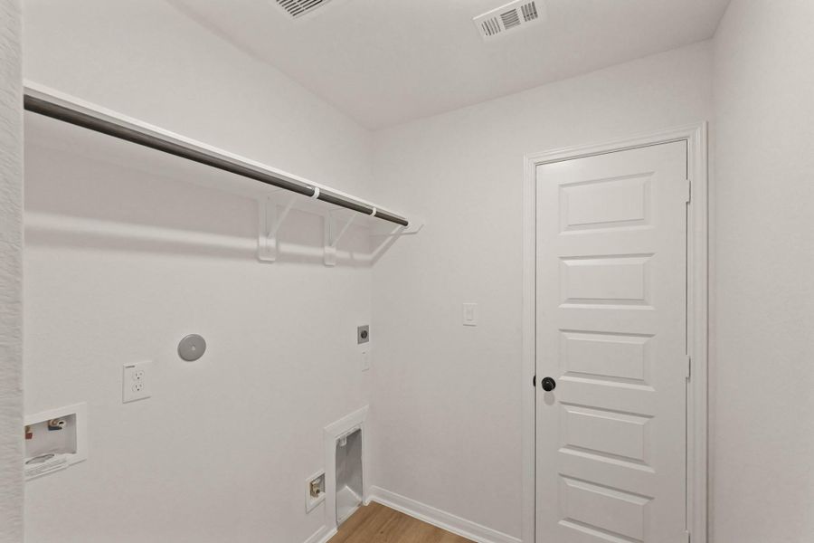 Laundry room (*Photo not of actual home and used for illustration purposes only.)