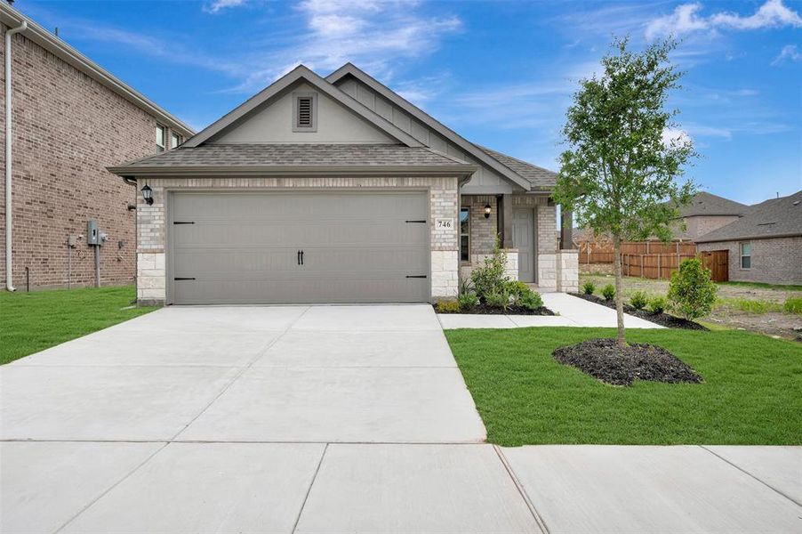 Front exterior of a new home in Elevon, Lavon, TX, highlighting curb appeal (Image 24). Front exterior of a new home in Elevon, Lavon, TX, highlighting curb appeal (Image 24).