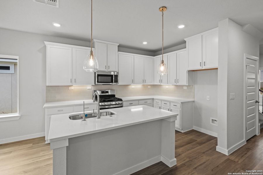 Furnished interior view inside a new home in August Fields, New Braunfels (Image 6).
