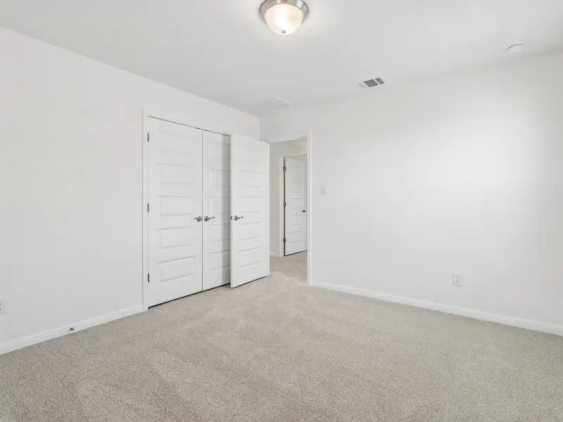 Spacious, unfurnished interior of a new home in Colony at Cole Springs - Boulevard Collection, Buda (Image 16).