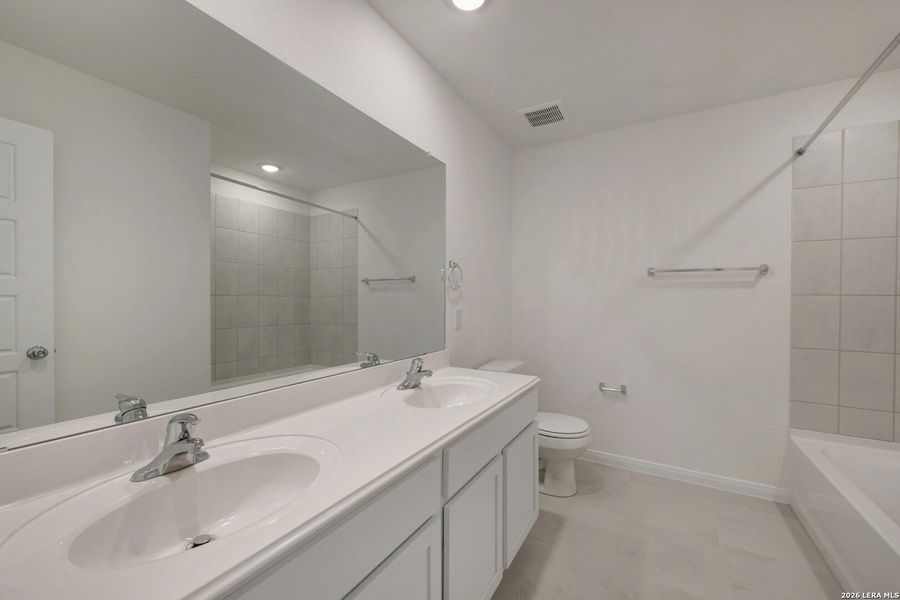 Furnished interior view inside a new home in Greenspoint Heights, Seguin (Image 6).