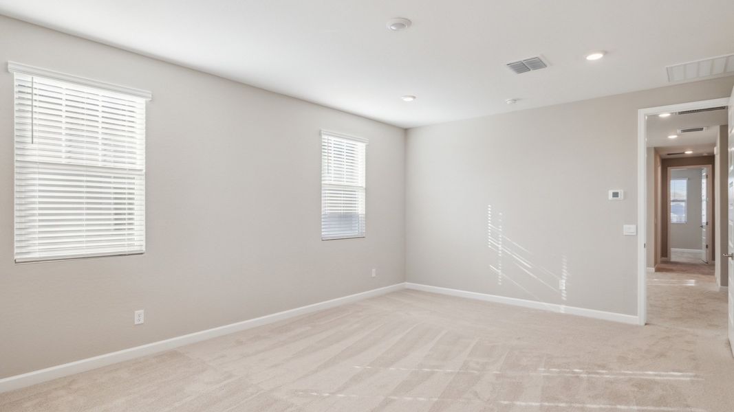 Spacious, unfurnished interior of a new home in Talinn Towns at Desert Ridge, Phoenix (Image 17).