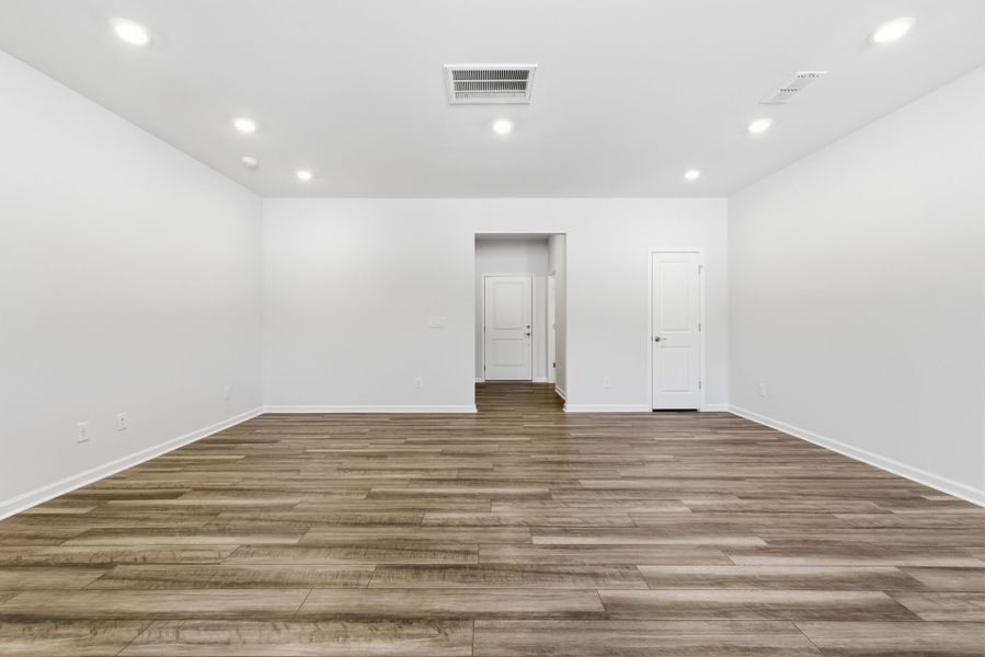 Spacious, unfurnished interior of a new home in Poets Walk, Whitsett (Image 23).