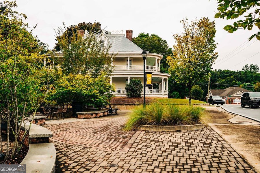 Front exterior of a new home in Rosewood Lake Estates, Hoschton, GA, highlighting curb appeal (Image 35).