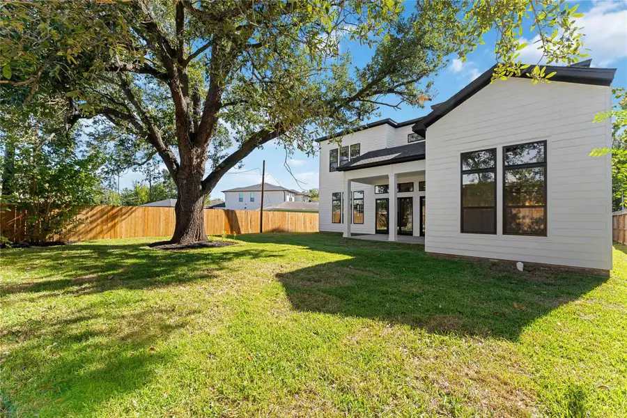 Exterior details and patio area of a home in , Houston (Image 4).