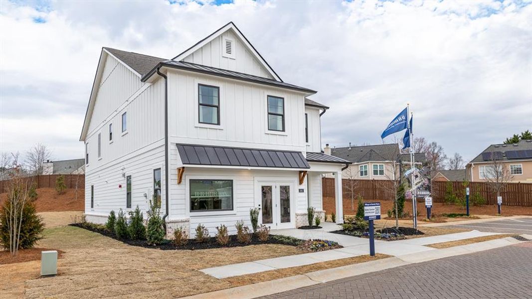 Front exterior of a new home in The Village at Sandy Plains, Marietta, GA, highlighting curb appeal (Image 24).