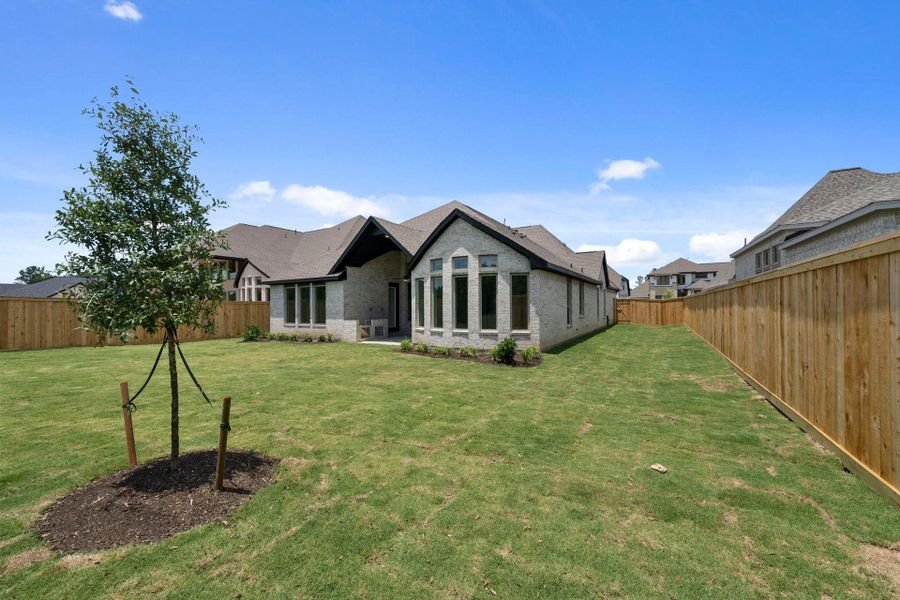 Exterior details and patio area of a home in The Highlands, Porter (Image 4).