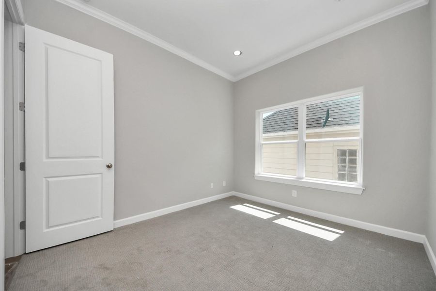 Additional bedroom with standard layout and natural lighting. Additional bedroom with standard layout and natural lighting.