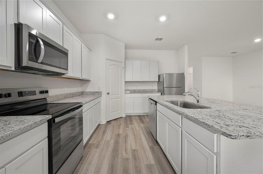 Furnished interior view inside a new home in Poinciana, Poinciana (Image 6).